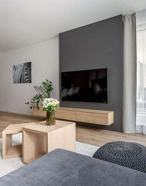 Praktický a moderní návrh obývací pokoj studia ZAKI Design